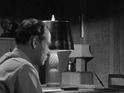 The Soul of a Monster stars Rose Hobart, George Macready, Jim Bannon, Jeanne Bates and Erik Rolf, and in this image we see a shadowed male standing in a doorway.